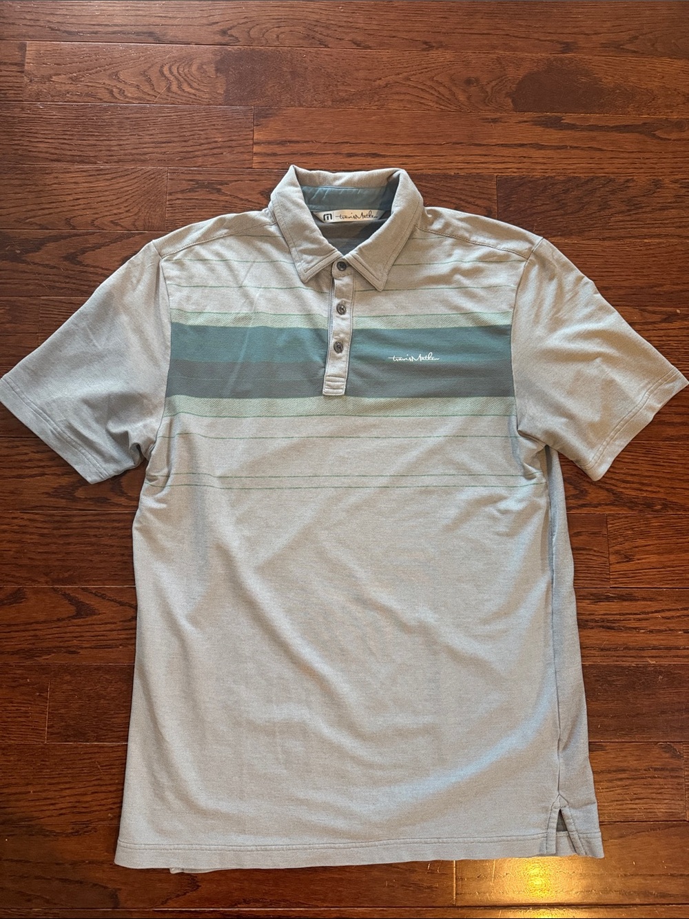 Travis Mathew Light Gray Polo with Green-Teal Chest Stripes